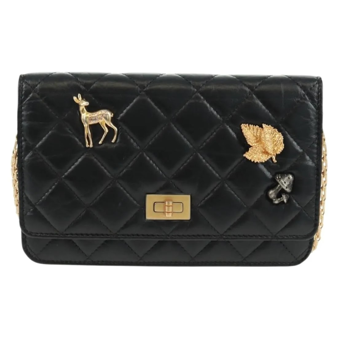 Chanel Reissue 2.55 Flap Leather Bag Lucky Charms Black: Chanel Reissue 2.55 Flap Leather Bag Lucky Charms Black This Chanel Lucky Charms Reissue 2.55 Flap Bag is crafted from black leather and designed for women. It features a classic flap style and is mad