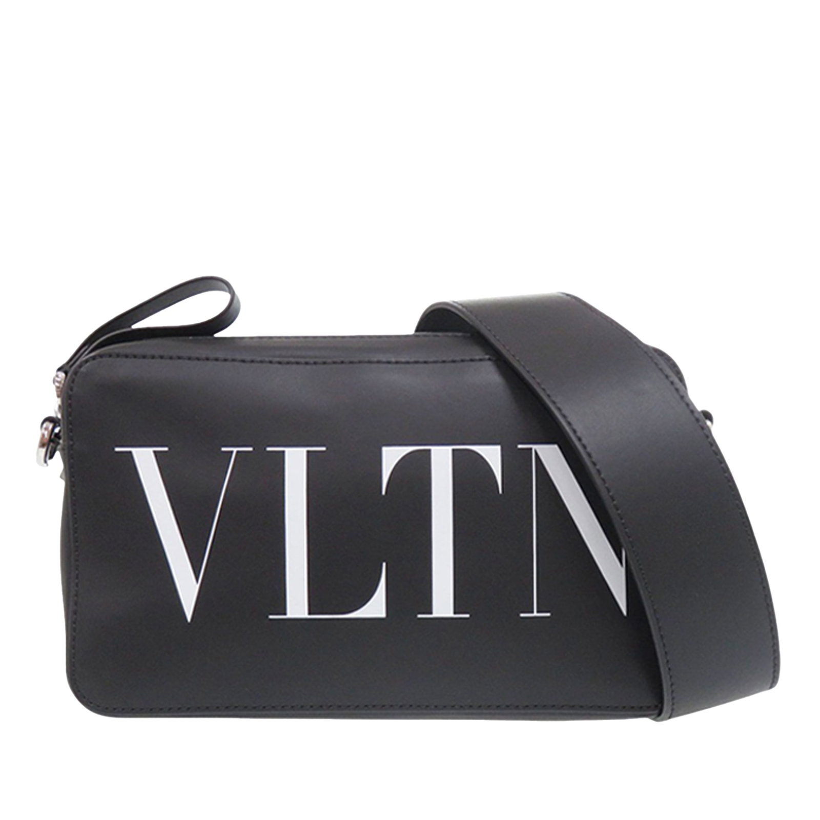 Valentino VLTN leather crossbody bag with adjustable strap: Valentino VLTN leather crossbody bag with adjustable strap Valentino Leather VLTN Crossbody in black leather with a top zip closure, an adjustable and detachable flat leather strap, and an interior sl