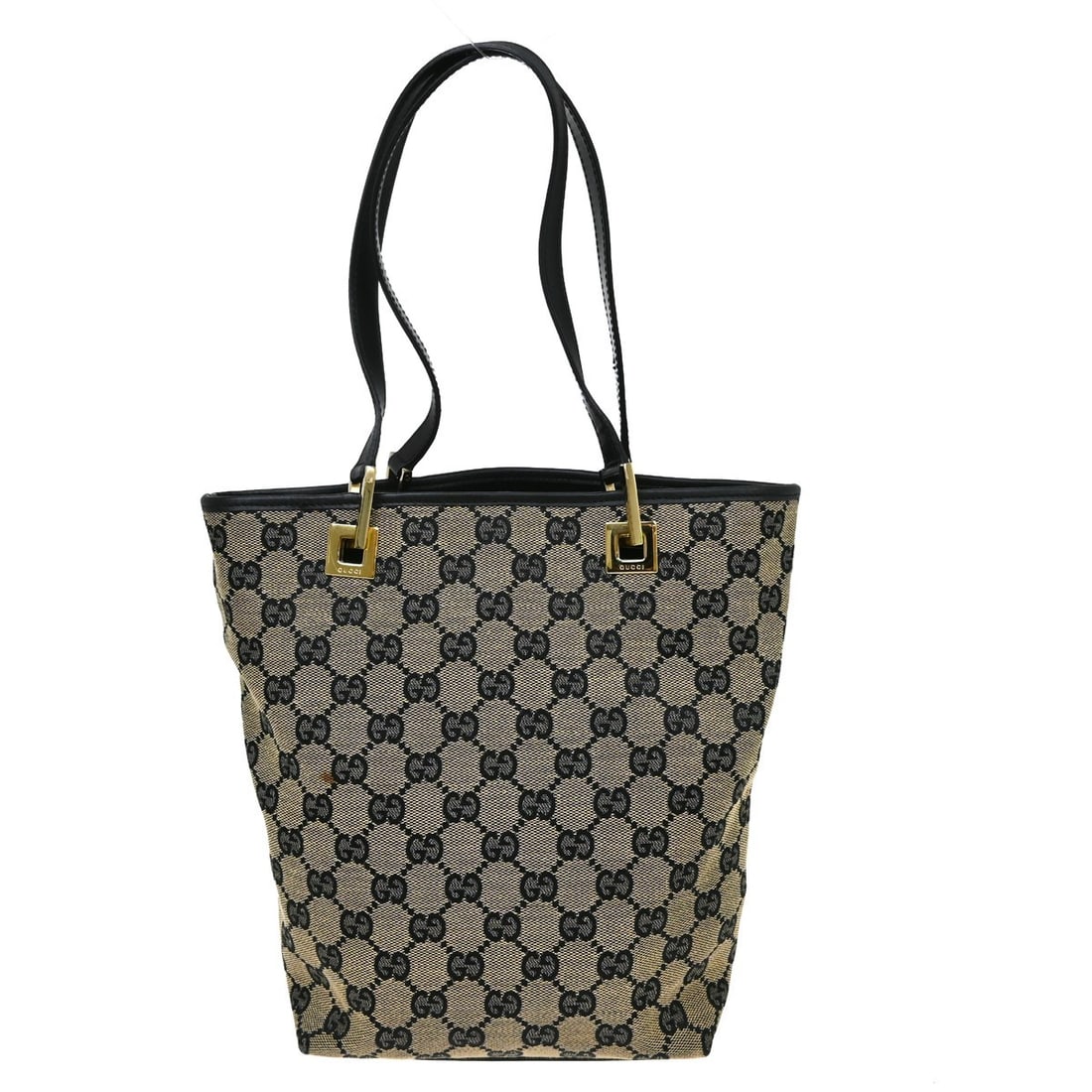 Gucci GG Medium Tote in Beige Canvas and Leather: Gucci GG Medium Tote in Beige Canvas and Leather Vintage Gucci tote bag in beige GG canvas with black accents. This medium women's bag features a canvas and leather exterior, black canvas strap, black