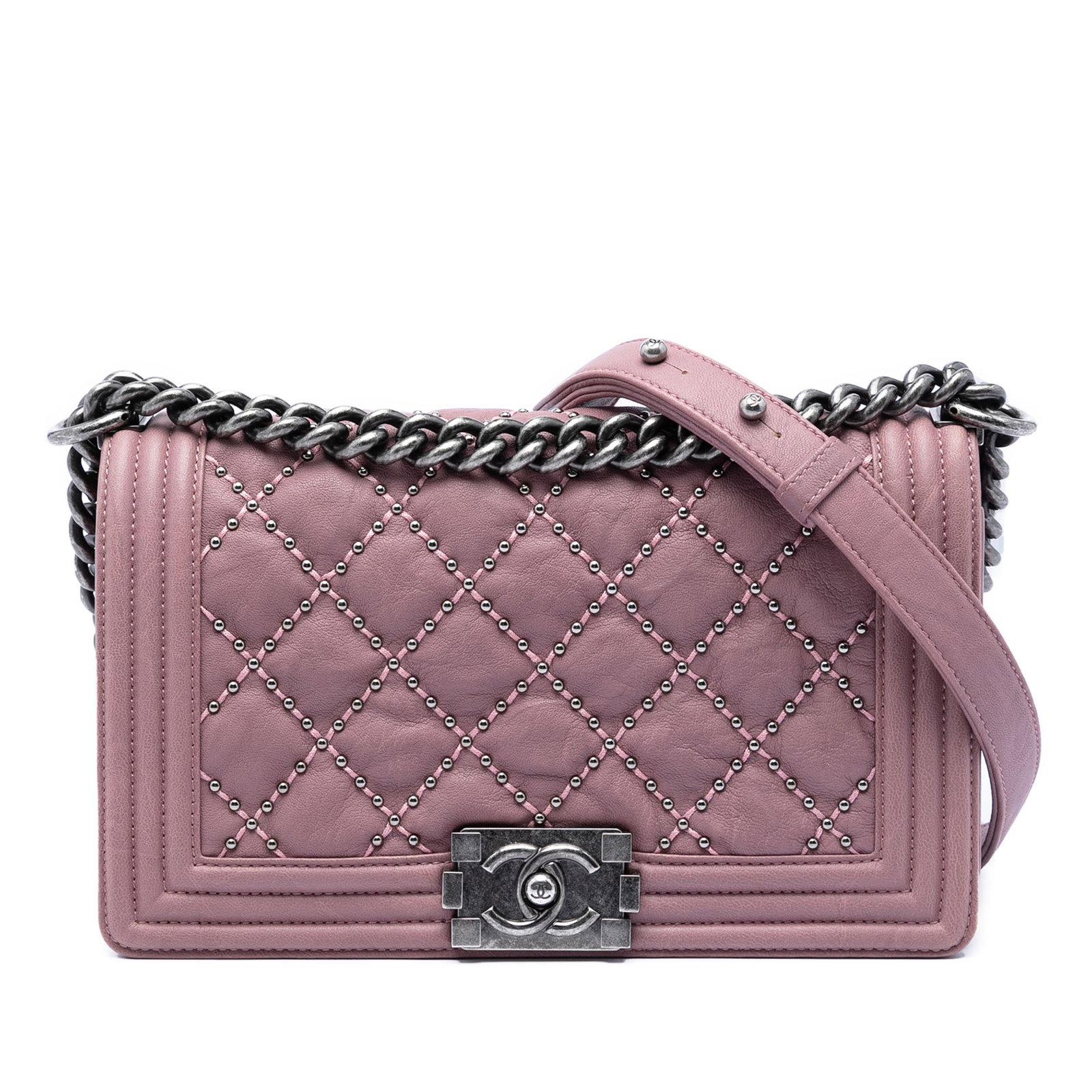 Chanel Boy Flap Pink Studded Quilted Calfskin Bag: Chanel Boy Flap Pink Studded Quilted Calfskin Bag This Chanel Old Medium Quilted Crumpled Calfskin Studded Boy Flap bag features a studded calfskin leather exterior, a chain shoulder strap with a leat