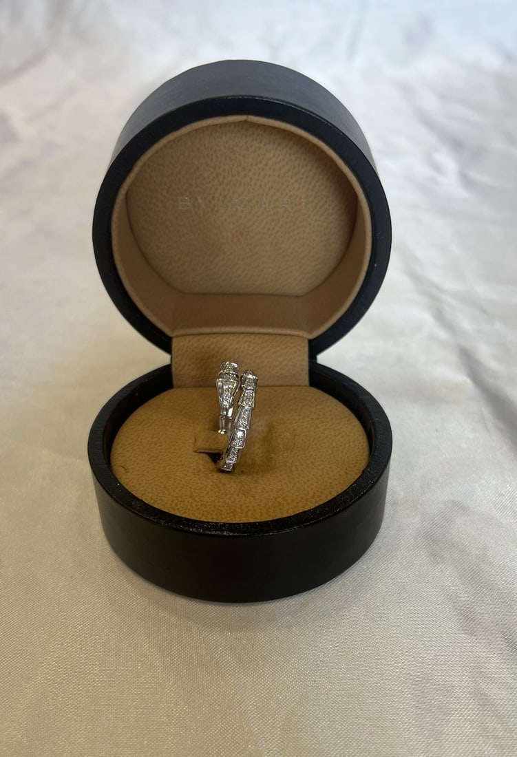 Bvlgari Serpenti Viper 18k White Gold Diamond Ring With Box Size 7 to 9: Bvlgari Serpenti Viper 18k White Gold Diamond Ring With Box Size 7 to 9 This BVLGARI Serpenti Viper ring is crafted from 18k white gold and features a striking diamond design. The ring is fully signed