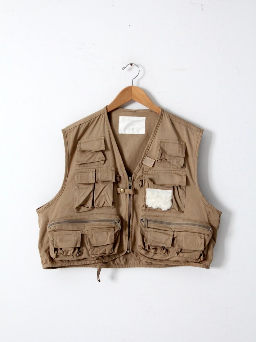 Gander Mountain Vintage Fly Fishing Vest Tan Cotton 12 Pockets: Gander Mountain Vintage Fly Fishing Vest Tan Cotton 12 Pockets Discover the charm of vintage outdoor gear with this Gander Mountain Fly Fishing Vest. Crafted from durable tan cotton, this vest is perf