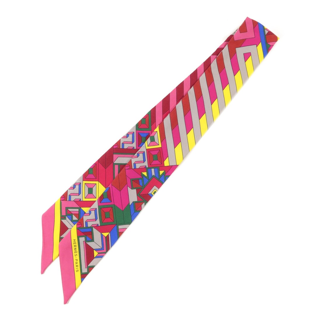 Hermes silk multicolor Twilly scarf: Hermes silk multicolor Twilly scarf This Hermes Twilly scarf is crafted from luxurious silk and features a vibrant multicolor design. Made in France, it is designed for women and offers a versatile ac