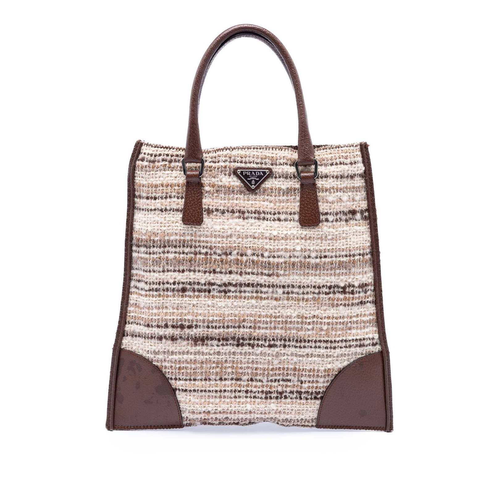 Prada Tweed Tote Bag with Leather Trim and Top Zip: Prada Tweed Tote Bag with Leather Trim and Top Zip This Prada Vitello Trimmed Tweed Flat Tote features a tweed body with leather trim, rolled leather handles, a top zip closure, an exterior back zip p
