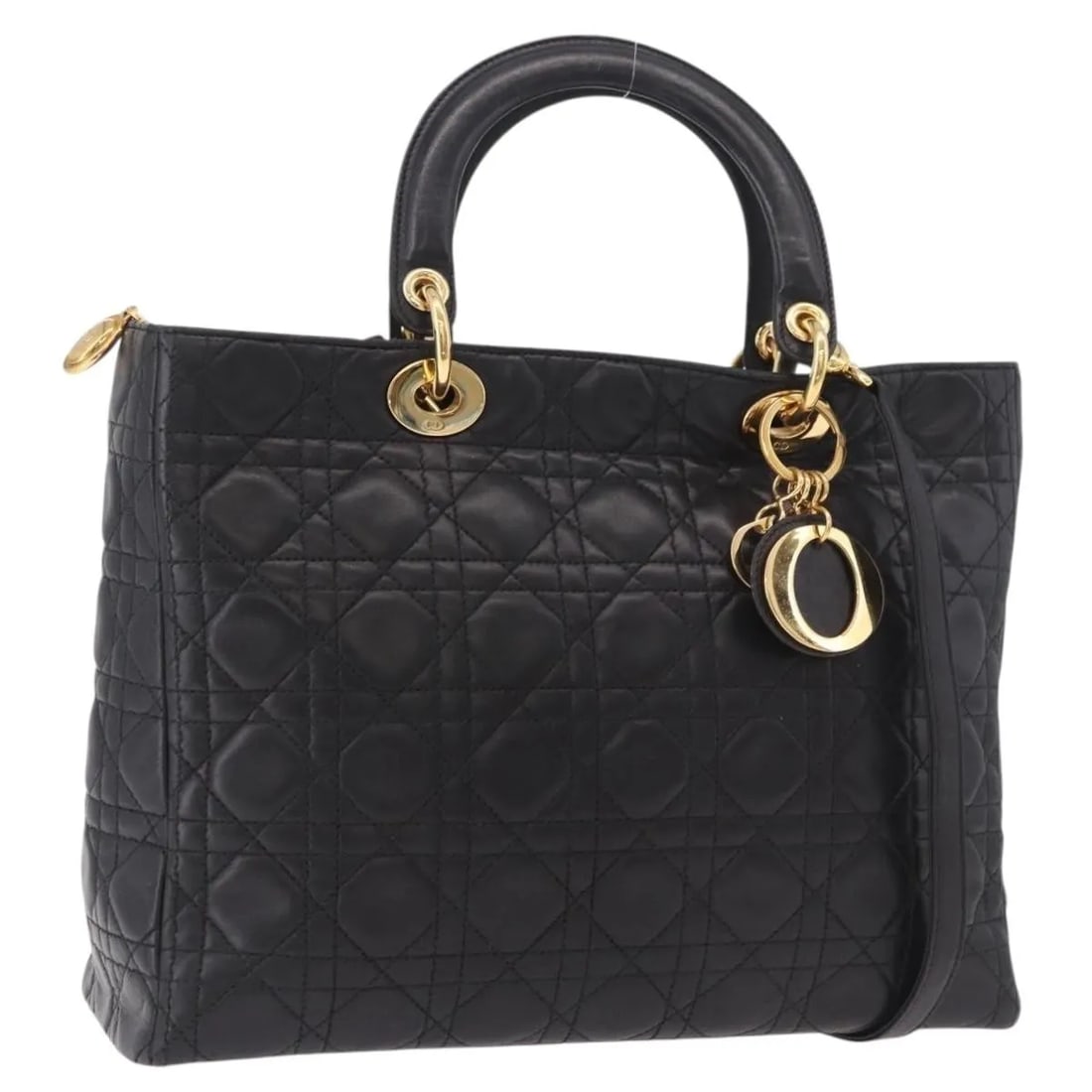 Christian Dior Lady Dior Black Leather Handbag: Christian Dior Lady Dior Black Leather Handbag This is a vintage Lady Dior bag crafted from black leather. The bag features a structured silhouette with handles and a shoulder strap, both exhibiting r