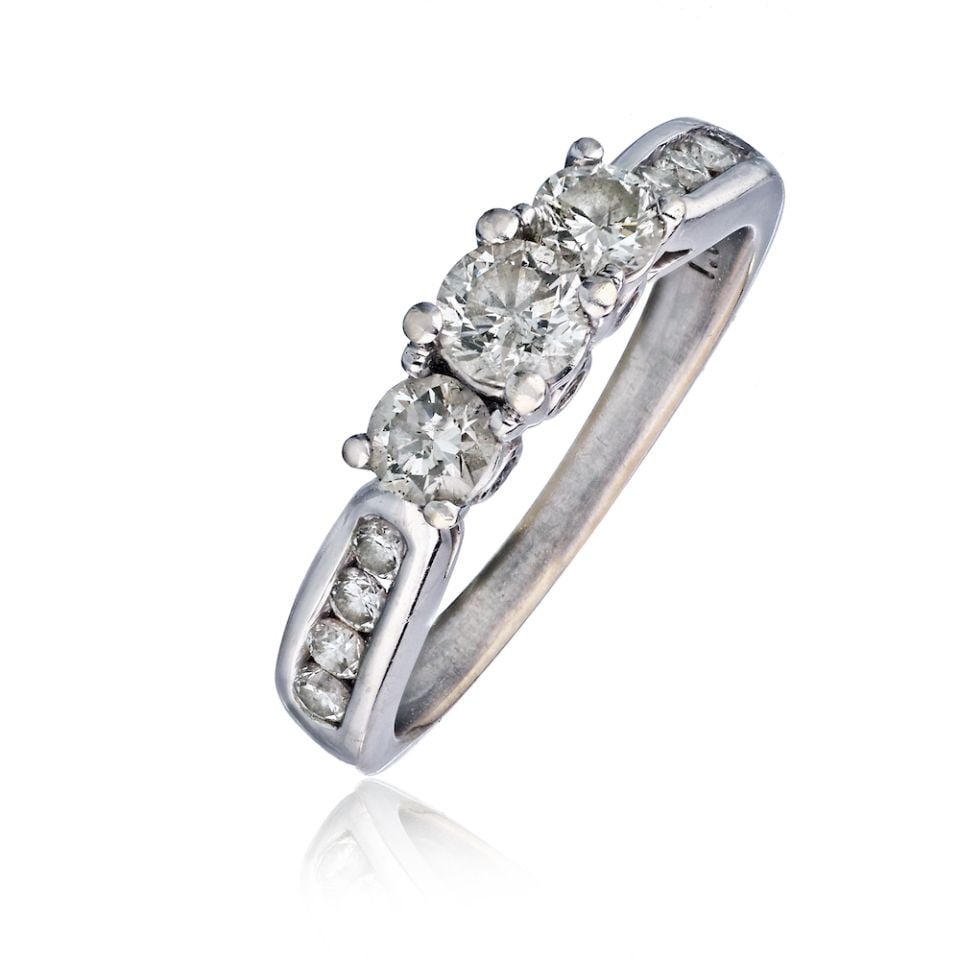Elegant 14K White Gold 1.00 cttw Diamond 3-Stone Ring: Elegant 14K White Gold 1.00 cttw Diamond 3-Stone Ring This exquisite 3-Stone Ring features a stunning design crafted from 14K white gold. The ring showcases a total diamond weight of 1.00 carat, makin