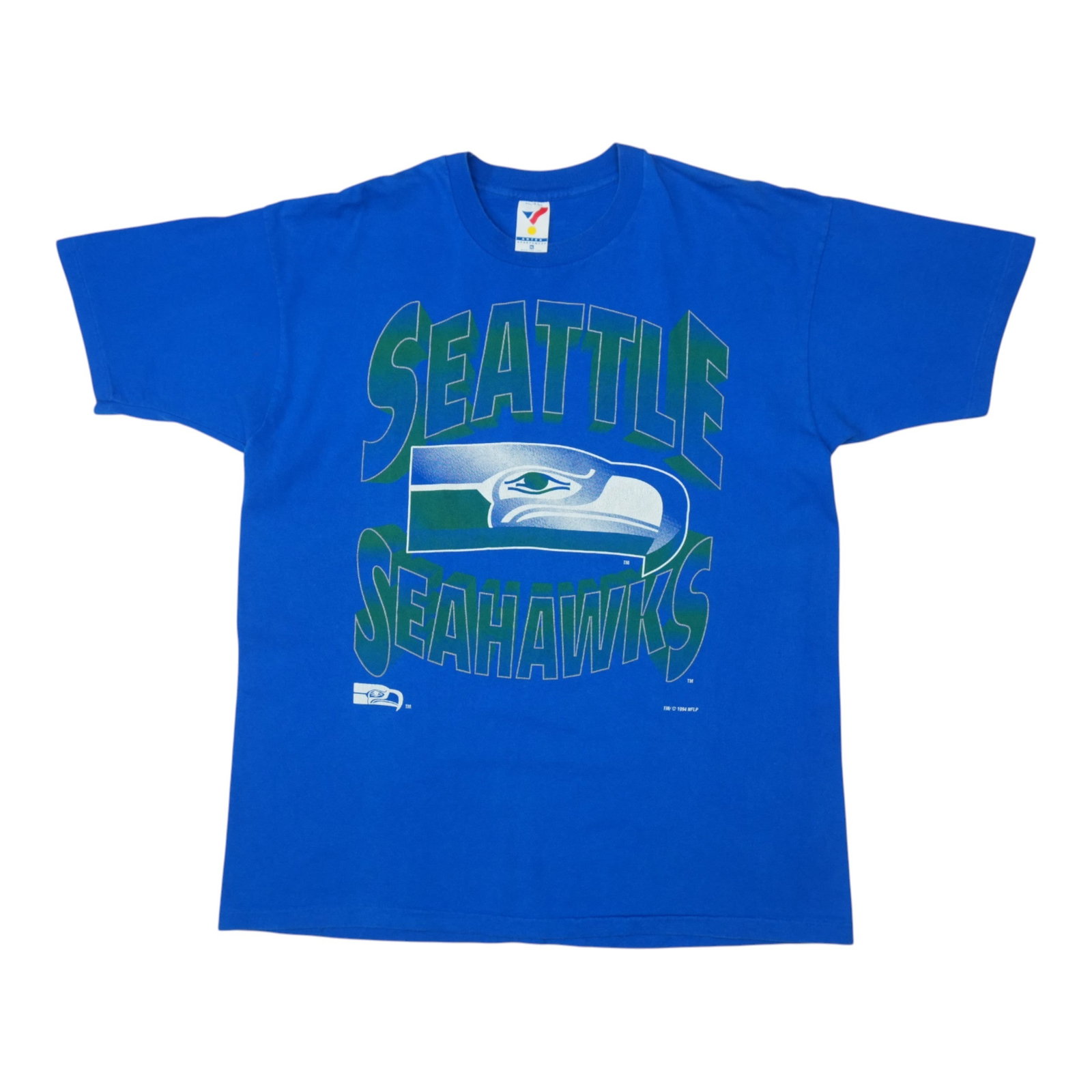 Vintage 1994 Seattle Seahawks Blue Cotton T-Shirt Extra Large: Vintage 1994 Seattle Seahawks Blue Cotton T-Shirt Extra Large This is an original vintage 1994 Seattle Seahawks shirt, not a modern reproduction. The shirt features no back graphics and is made from 1