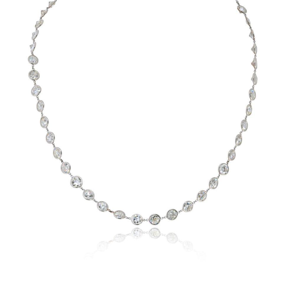 Platinum Necklace With 19ct Old European Cut Diamonds By The Yard: Platinum Necklace With 19ct Old European Cut Diamonds By The Yard This platinum necklace features 48 old European cut diamonds, totaling 19.00 carats. Each diamond is approximately 0.40 carats, showca