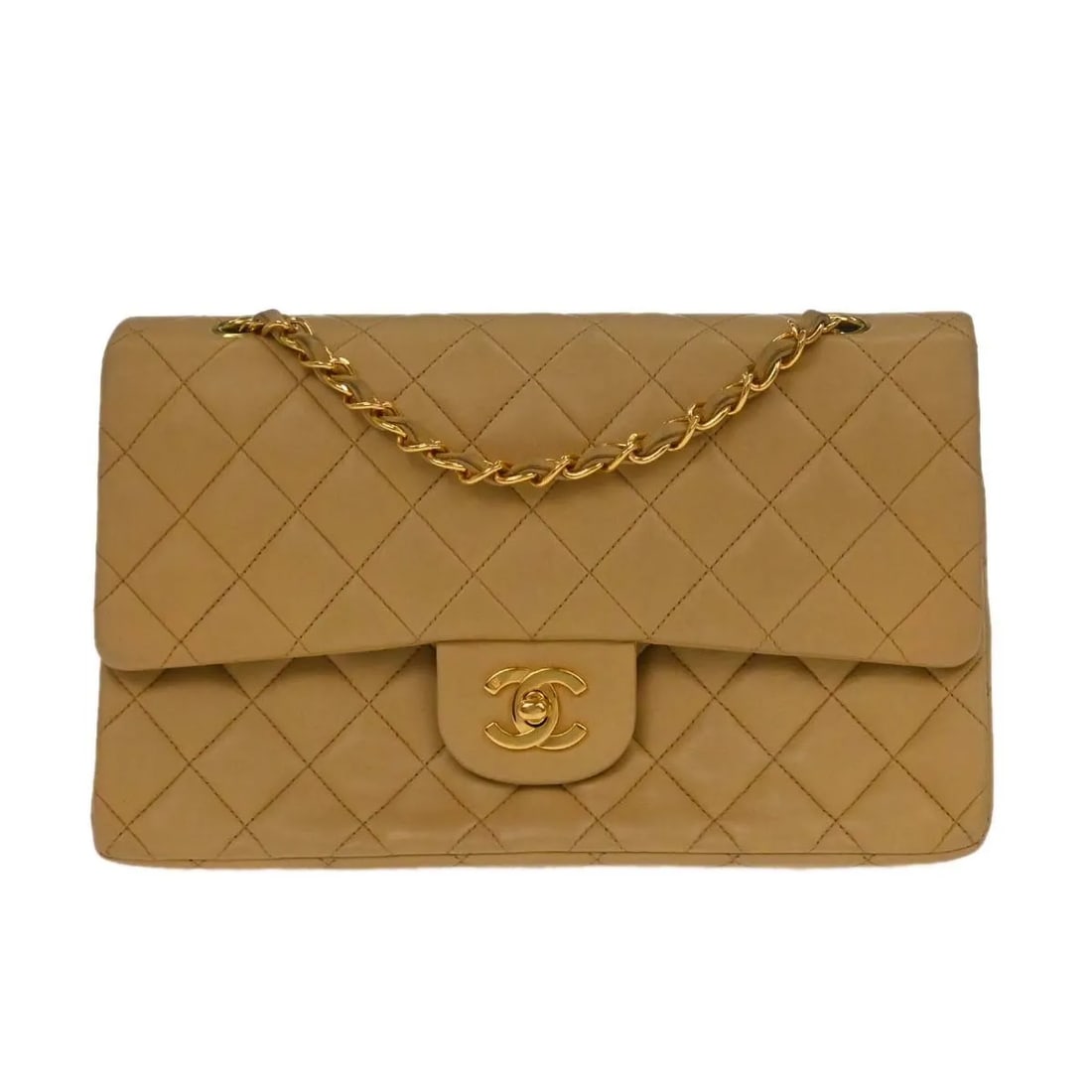 Chanel Timeless Beige Calfskin Double Flap Handbag: Chanel Timeless Beige Calfskin Double Flap Handbag This Chanel Timeless Classic Double Flap Bag features a beige calfskin leather exterior and is designed for women. The bag is crafted in France and s