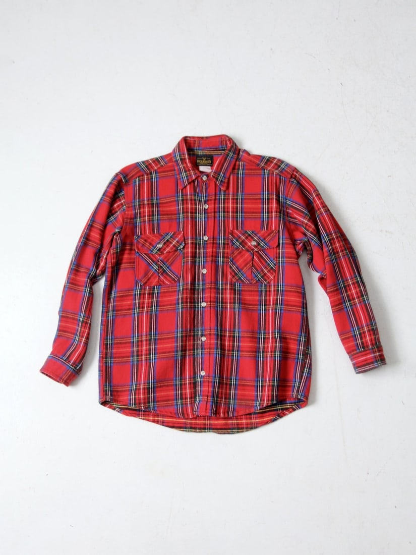 1960s Deerskin by Melton Red Blue Plaid Flannel Shirt: 1960s Deerskin by Melton Red Blue Plaid Flannel Shirt Discover a classic piece of fashion history with this 1960s vintage Deerskin by Melton plaid shirt. Crafted from soft flannel, this shirt features