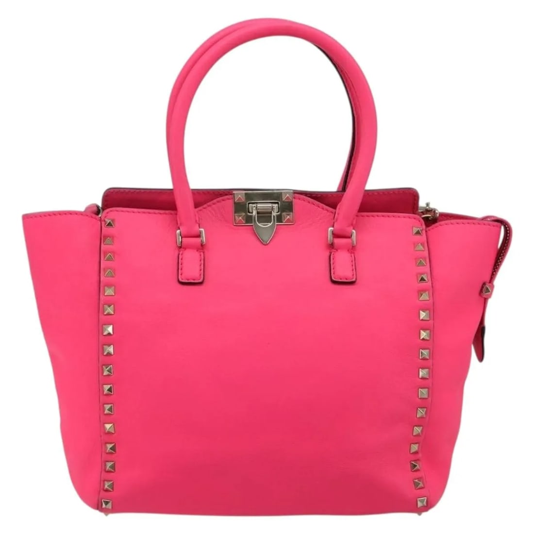 Valentino Garavani Rockstud pink leather tote: Valentino Garavani Rockstud pink leather tote This Valentino Garavani Rockstud Tote is crafted from soft pink leather and features the brand's signature stud detailing. Made in Italy, this tote offers