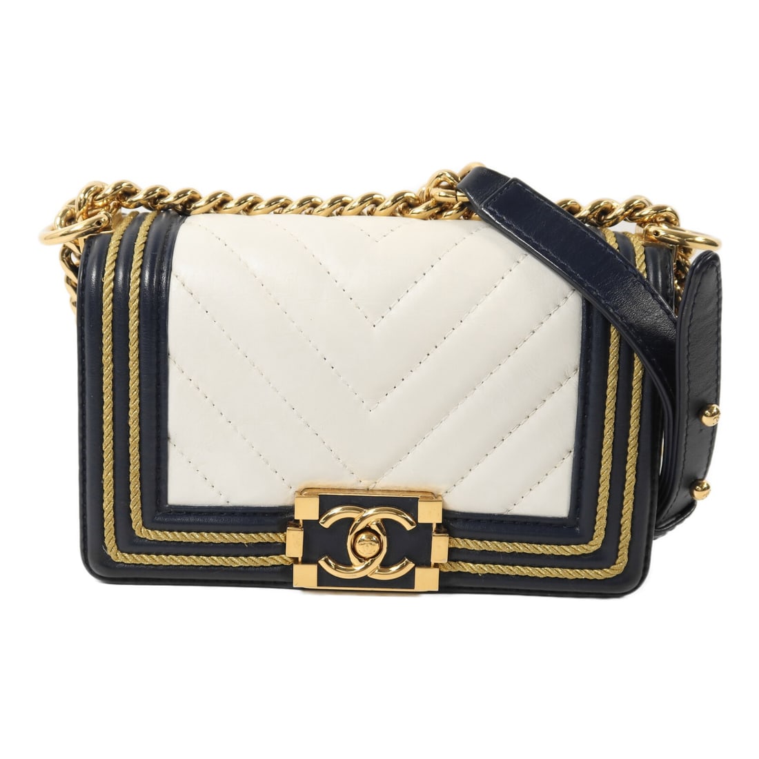 Chanel Boy 20 Navy Calfskin Shoulder Bag with Gold Hardware: Chanel Boy 20 Navy Calfskin Shoulder Bag with Gold Hardware This CHANEL Boy 20 shoulder bag features a classic navy and white design crafted from calfskin leather. It is accented with gold-tone hardwa