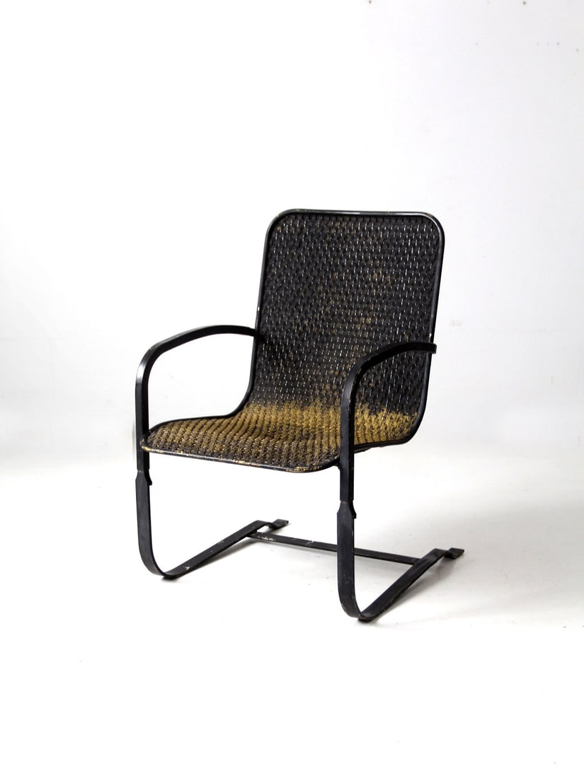 Vintage Mid Century Metal Cantilever Patio Chair: Vintage Mid Century Metal Cantilever Patio Chair Discover a charming mid 20th century patio chair designed for both comfort and style. This metal outdoor armchair features a unique cantilever "bouncer