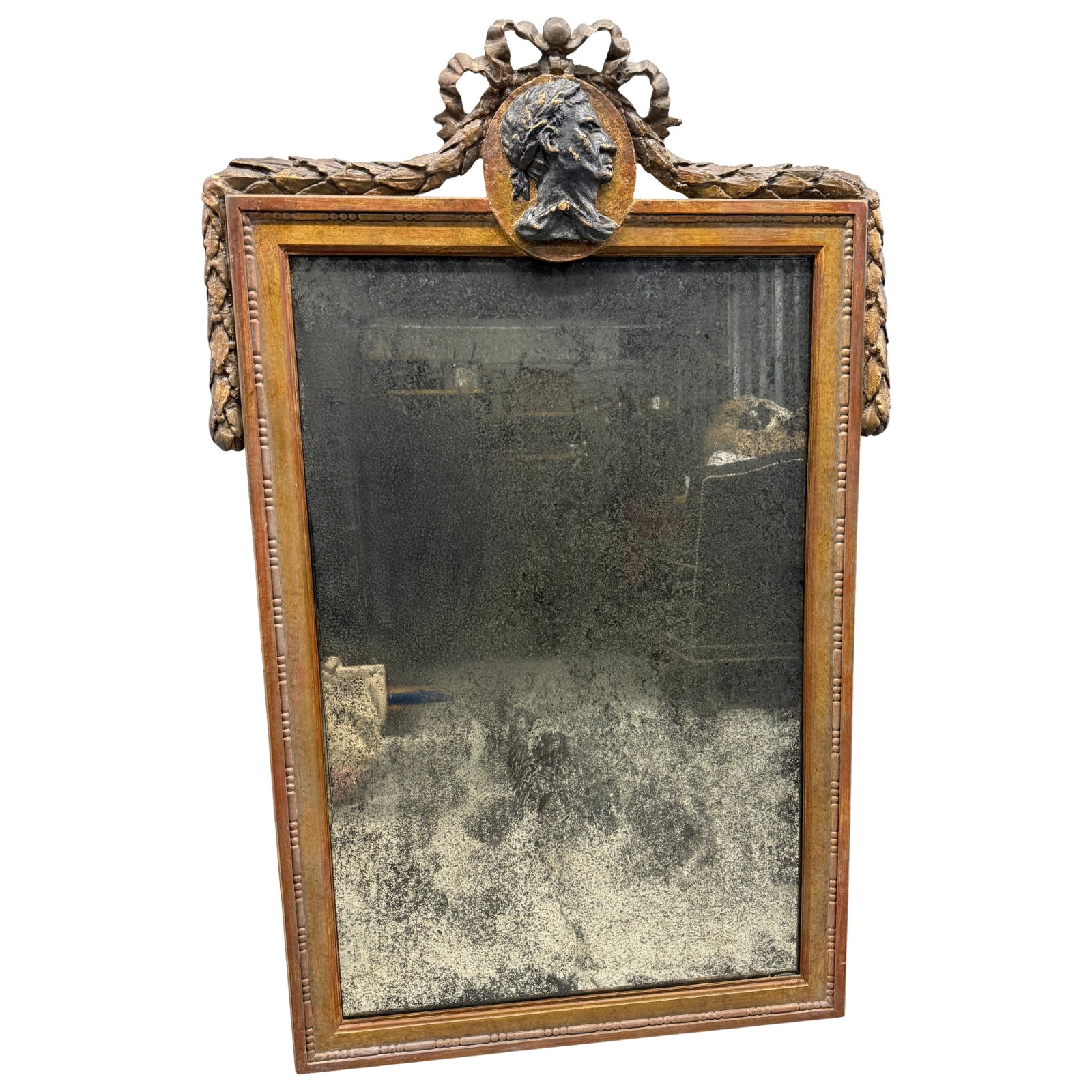 Neoclassical Wall Mirror With Gilt Frame and Classical Medallion Relief: Neoclassical Wall Mirror With Gilt Frame and Classical Medallion Relief This large wall mirror is designed in the neoclassical style, inspired by late 18th-century French Louis XVI models. The rectang