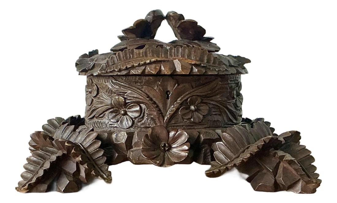 Hand Carved Black Forest Wooden Casket Box with Botanical Relief: Hand Carved Black Forest Wooden Casket Box with Botanical Relief This vintage Black Forest casket box showcases exceptional hand-carved detail, embodying the rustic artistry of traditional German and 