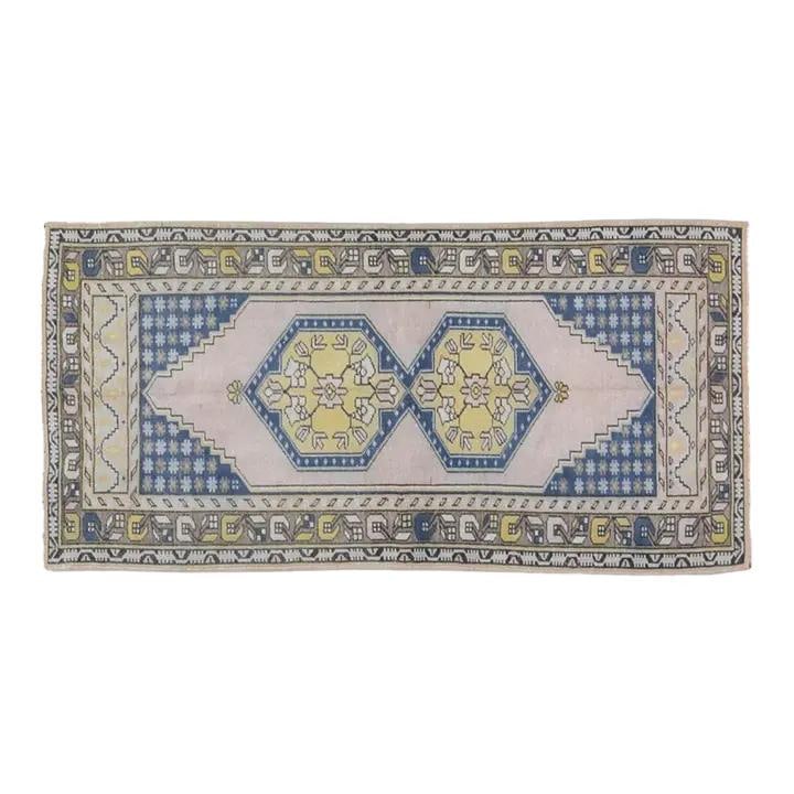 3'5 x 7 Foot Hand Knotted Wool Anatolian Rug in Gray: 3'5 x 7 Foot Hand Knotted Wool Anatolian Rug in Gray This vintage Turkish Anatolian rug is hand-knotted from wool using traditional rug-making techniques. The rug offers a blend of timeless craftsmans