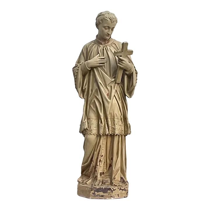 Early 20th Century Ecru Cast Plaster Saint Aloysius Gonzaga Sculpture: Early 20th Century Ecru Cast Plaster Saint Aloysius Gonzaga Sculpture This stunning early 20th-century cast plaster statue depicts Saint Aloysius Gonzaga with remarkable detail and realism. The sculpt