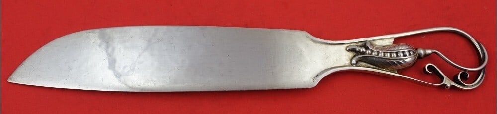 Carl Poul Petersen Peapod Sterling Silver Ice Cream Slice 10.5" Knife: Carl Poul Petersen Peapod Sterling Silver Ice Cream Slice 10.5" Knife This exquisite ice cream slice from the Peapod pattern by Carl Poul Petersen features a beautifully crafted figural peapod motif. 