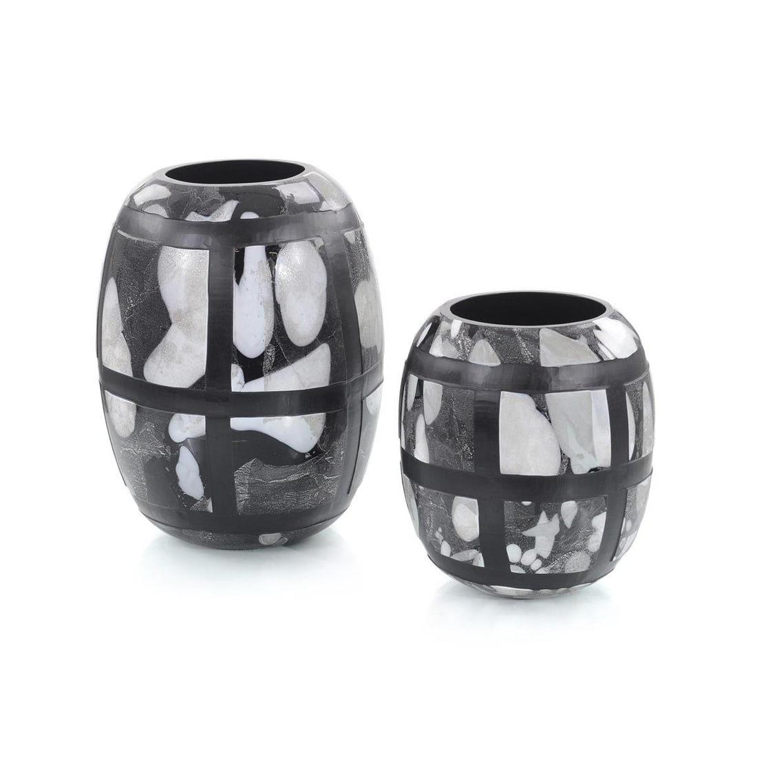 John-Richard Black and White Glass Vases Set: John-Richard Black and White Glass Vases Set Introducing a pair of striking graphic black and white vases that serve as perfect decorative accents for your home. Crafted from high-quality glass, these
