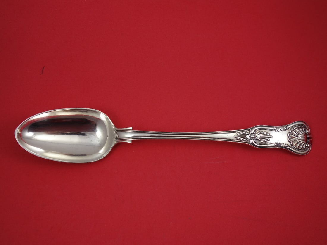 King by Henry Holland 11 7/8 Inch Sterling Silver Spoon London 1862: King by Henry Holland 11 7/8 Inch Sterling Silver Spoon London 1862 This exquisite sterling silver stuffing spoon, crafted in London circa 1862, features the distinguished King pattern by Henry Hollan