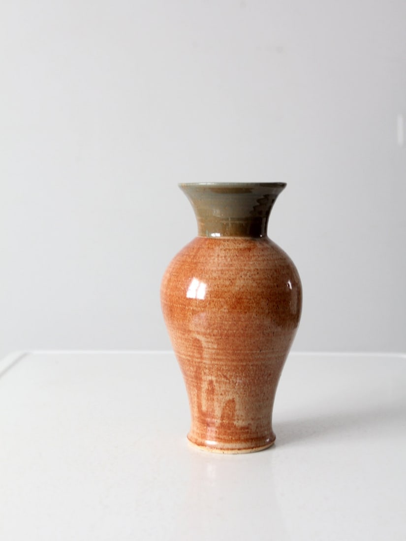 Signed Vintage Studio Pottery Vase with Brown and Olive Glaze: Signed Vintage Studio Pottery Vase with Brown and Olive Glaze This vintage studio pottery vase showcases the artistry of its creator, featuring a unique handmade design with a beautiful brown washed g