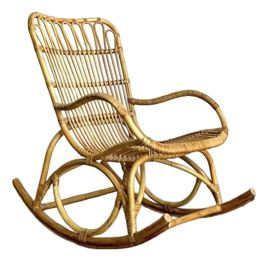 Mid Century Rattan Loop Rocker Vintage Boho Chair: Mid Century Rattan Loop Rocker Vintage Boho Chair This vintage rocking chair showcases a distinctive loop design crafted from natural rattan, reflecting the relaxed elegance of the Mid-Century Modern 