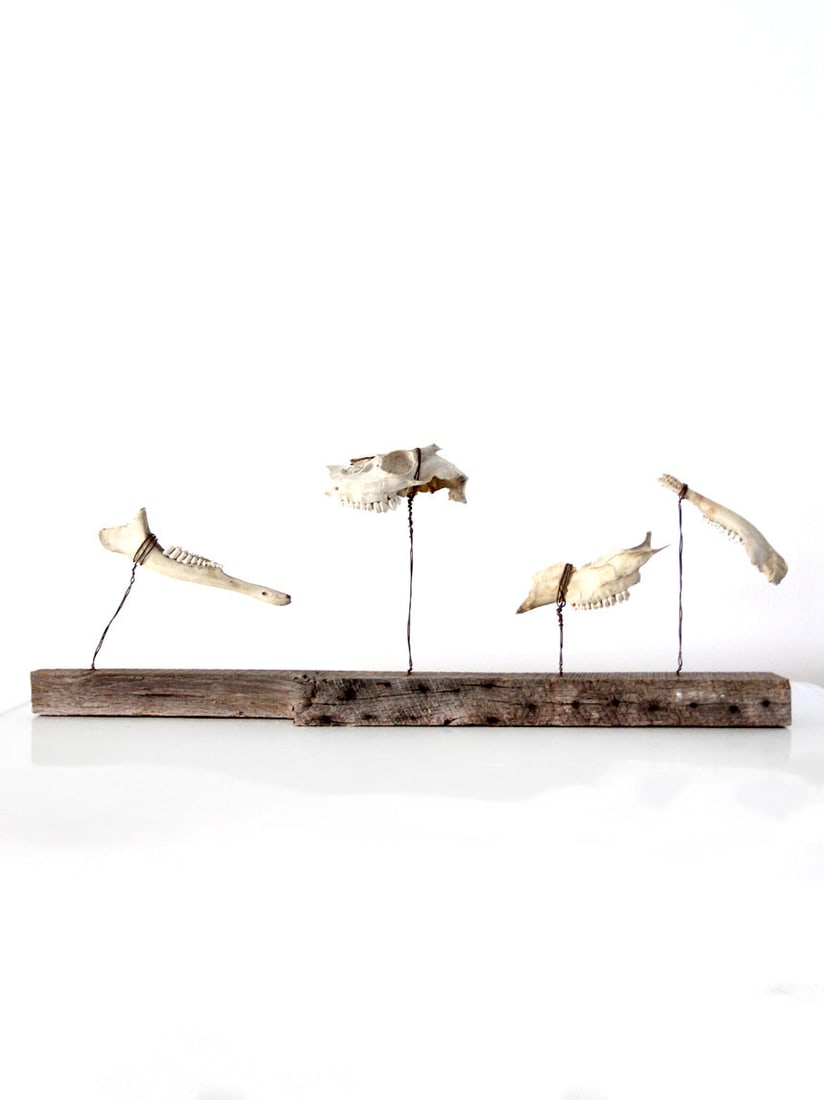 1920s Handcrafted Folk Art Bone Sculpture on Wood: 1920s Handcrafted Folk Art Bone Sculpture on Wood Discover the charm of this handcrafted 1920s folk art bone sculpture, a distinctive piece of nature-inspired decor. This unique sculpture features fou