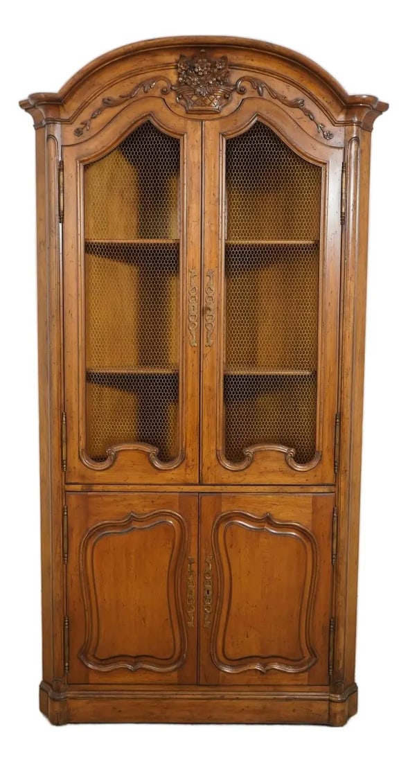 Country French Style Walnut Corner Cabinet Attributed to Don Rousseau: Country French Style Walnut Corner Cabinet Attributed to Don Rousseau This Country French walnut corner cabinet, attributed to Don Rousseau or a similar manufacturer, features a factory distressed fin