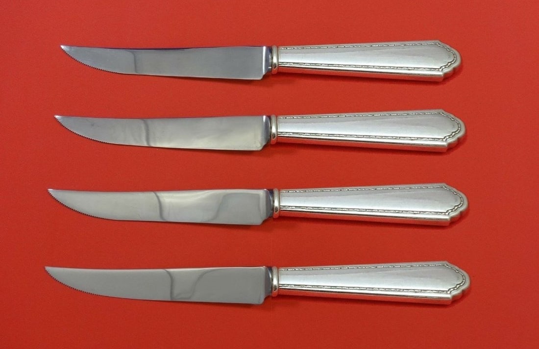 Lunt Sterling Silver William and Mary Steak Knife Set 4pc Custom 8.5": Lunt Sterling Silver William and Mary Steak Knife Set 4pc Custom 8.5" This exquisite 4-piece steak knife set from the William and Mary pattern by Lunt is crafted from sterling silver with a hollow han