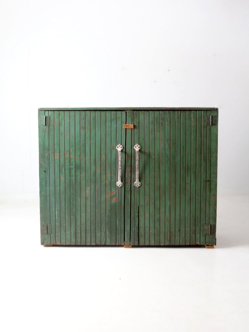 Vintage Green Beadboard Antique Wood Cabinet with Double Doors: Vintage Green Beadboard Antique Wood Cabinet with Double Doors Discover this charming antique painted wood cabinet, a perfect blend of functionality and vintage aesthetics. Featuring a substantial gre