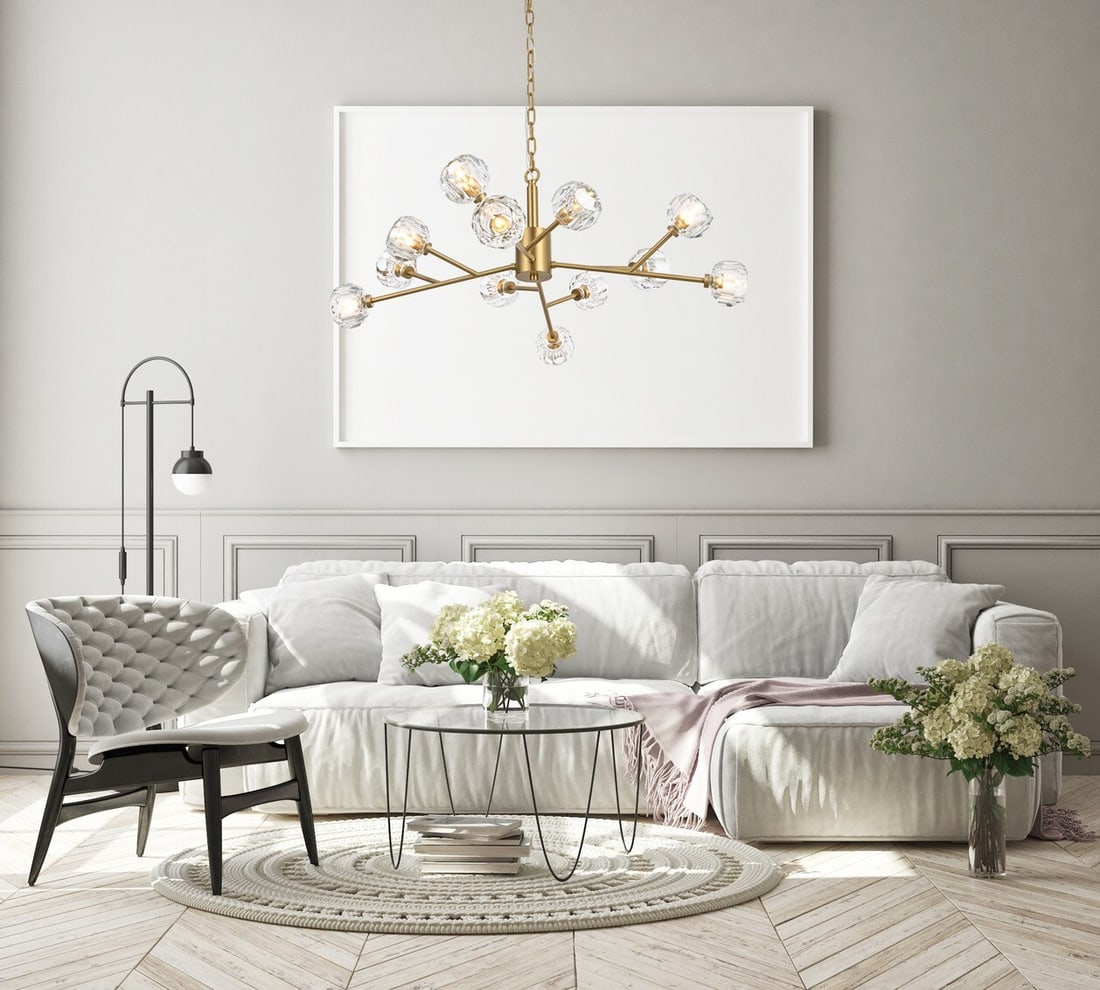 Graham 35 in Gold Crystal 12-Light Pendant: Graham 35 in Gold Crystal 12-Light Pendant Modern gold pendant chandelier with a crystal and iron construction, designed with 12 lights and a Sputnik style. It is hardwired, intended for indoor instal