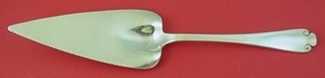 Tiffany & Co Flemish Sterling Silver Pie Server 11 1/8": Tiffany & Co Flemish Sterling Silver Pie Server 11 1/8" This exquisite pie server from Tiffany & Co. features the elegant Flemish pattern, showcasing a flat handle and a serrated blade for effortless 