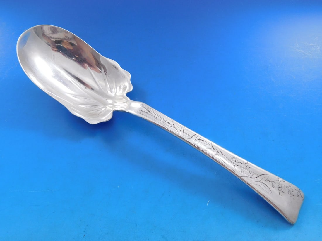Tiffany Sterling Silver Salad Serving Spoon 9 inch Lap Over Edge Flowers: Tiffany Sterling Silver Salad Serving Spoon 9 inch Lap Over Edge Flowers This exquisite Lap Over Acid Etched Salad Serving Spoon by Tiffany & Co. showcases a delicate flower motif and is crafted from 