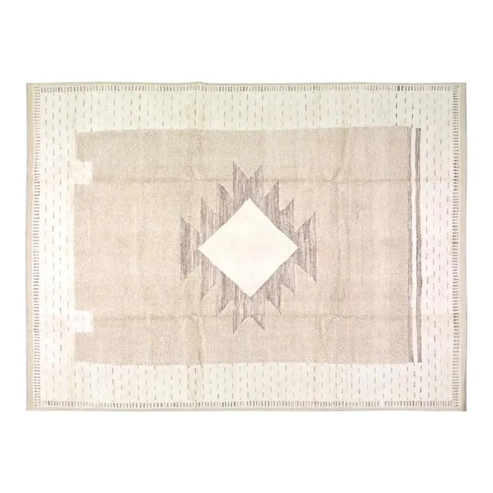 9x12 Tan Wool Area Rug Hand Knotted Moroccan Design: 9x12 Tan Wool Area Rug Hand Knotted Moroccan Design This Moroccan hand-knotted wool rug showcases traditional craftsmanship combined with a modern design sensibility. Meticulously crafted, it features