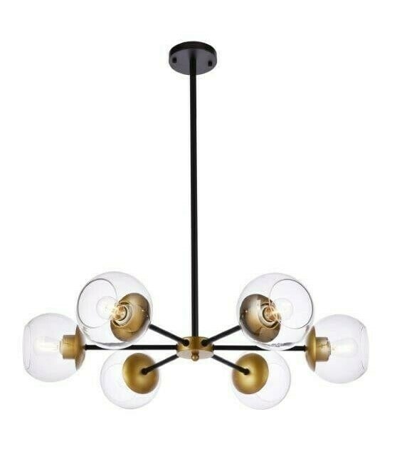 Briggs 6-Light Brass Black Pendant Chandelier 30 Inch: Briggs 6-Light Brass Black Pendant Chandelier 30 Inch This modern pendant chandelier features six lights and a stylish combination of brass and black finishes, making it an elegant addition to dining 