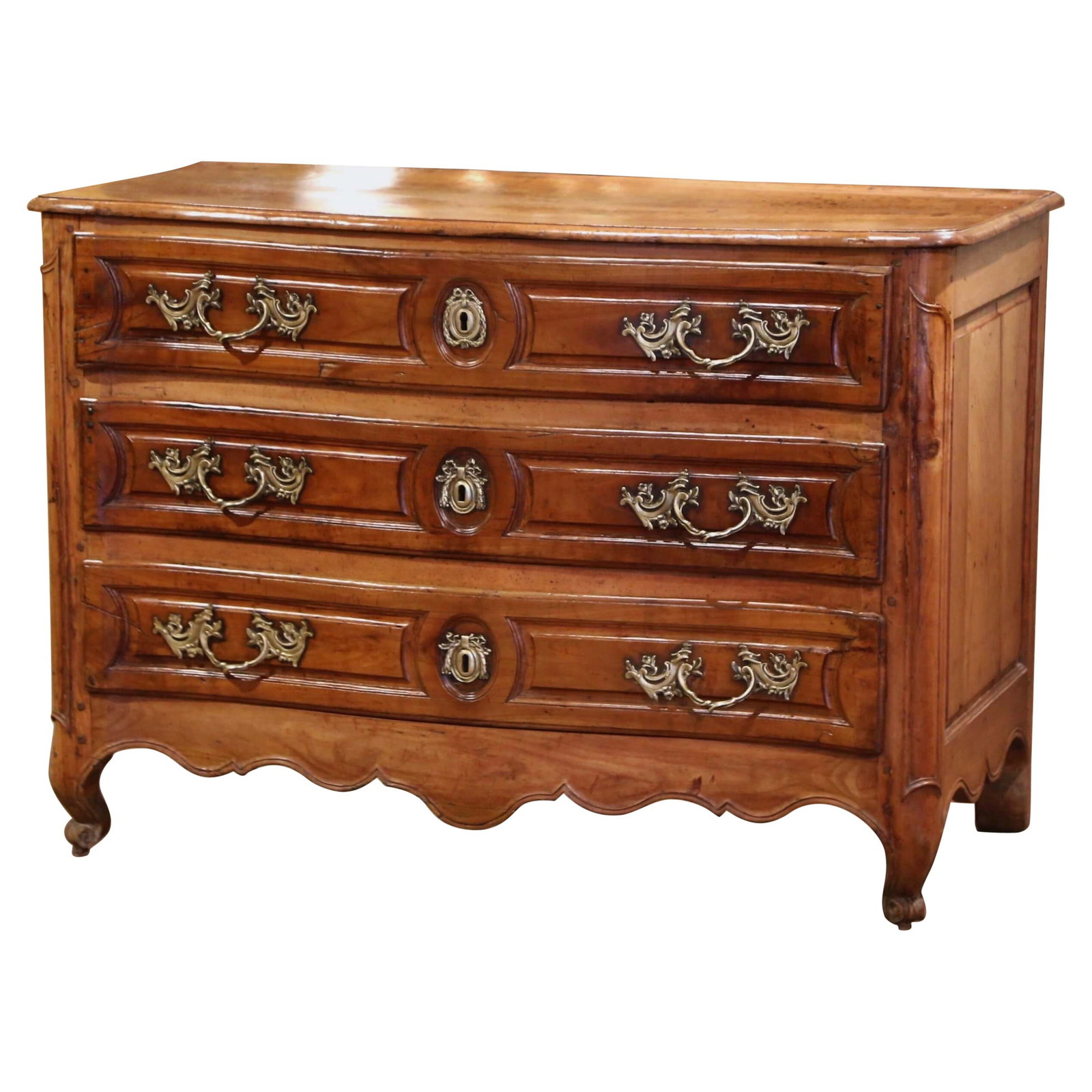 Antique 18th Century French Louis XV Carved Cherry Commode with Bronze Mounts: Antique 18th Century French Louis XV Carved Cherry Commode with Bronze Mounts This exquisite 18th Century French Louis XV Commode Lyonnaise is a stunning example of the craftsmanship from the mid-18th