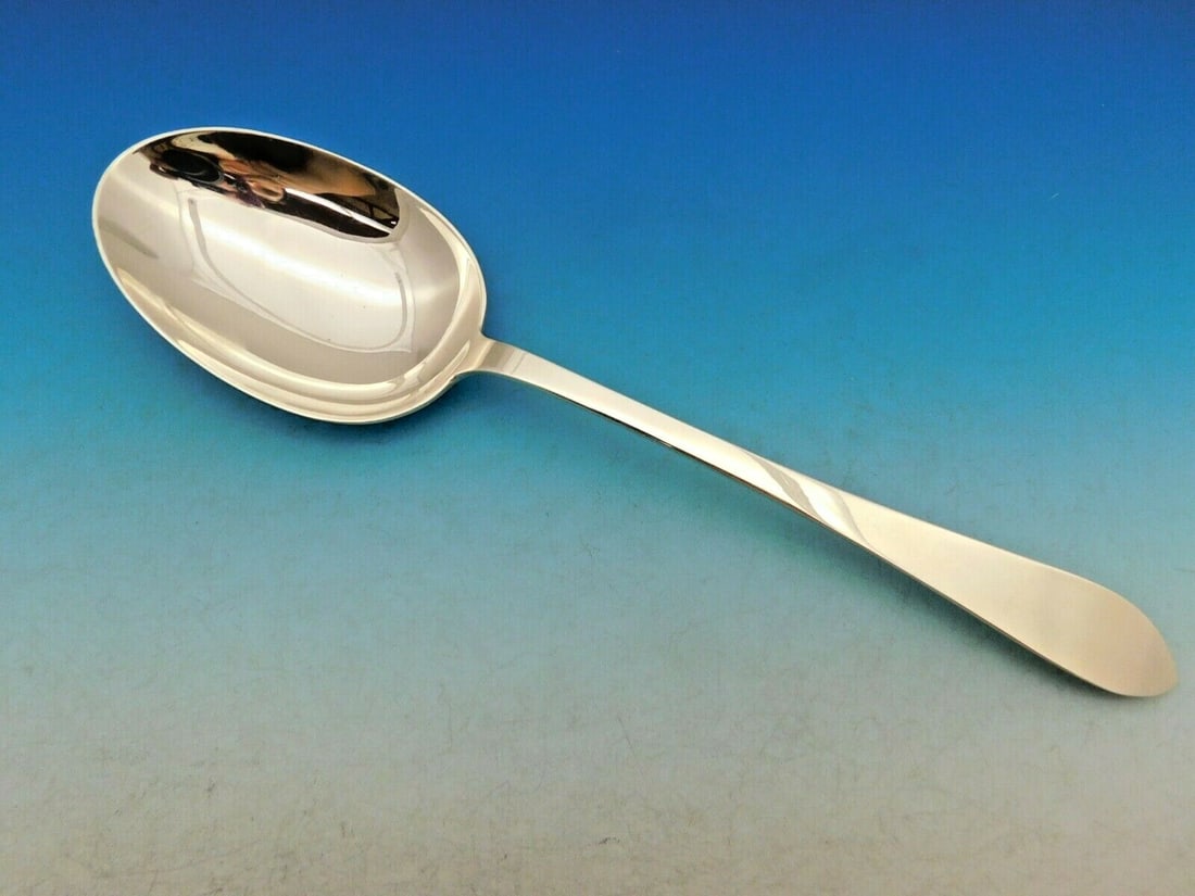 Tiffany & Co. Faneuil Sterling Silver Vegetable Serving Spoon 9 5/8 inches: Tiffany & Co. Faneuil Sterling Silver Vegetable Serving Spoon 9 5/8 inches This exquisite vegetable serving spoon is crafted in sterling silver and features the elegant Faneuil pattern by Tiffany & Co