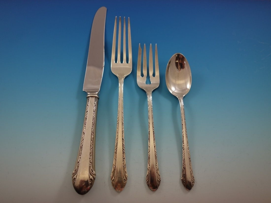 Alvin Chased Romantique Sterling Silver 4-Piece Dinner Set Vintage: Alvin Chased Romantique Sterling Silver 4-Piece Dinner Set Vintage This exquisite 4-piece dinner place setting in the Chased Romantique pattern by Alvin is a stunning addition to any dining collection