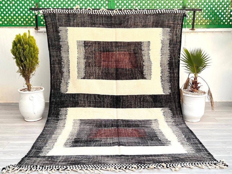 Authentic Handmade Moroccan Berber Wool Rug 9.84 x 6.56 Feet: Authentic Handmade Moroccan Berber Wool Rug 9.84 x 6.56 Feet Add a touch of elegance to your space with this stunning authentic handmade Moroccan Berber wool rug. Crafted by skilled local Berber women