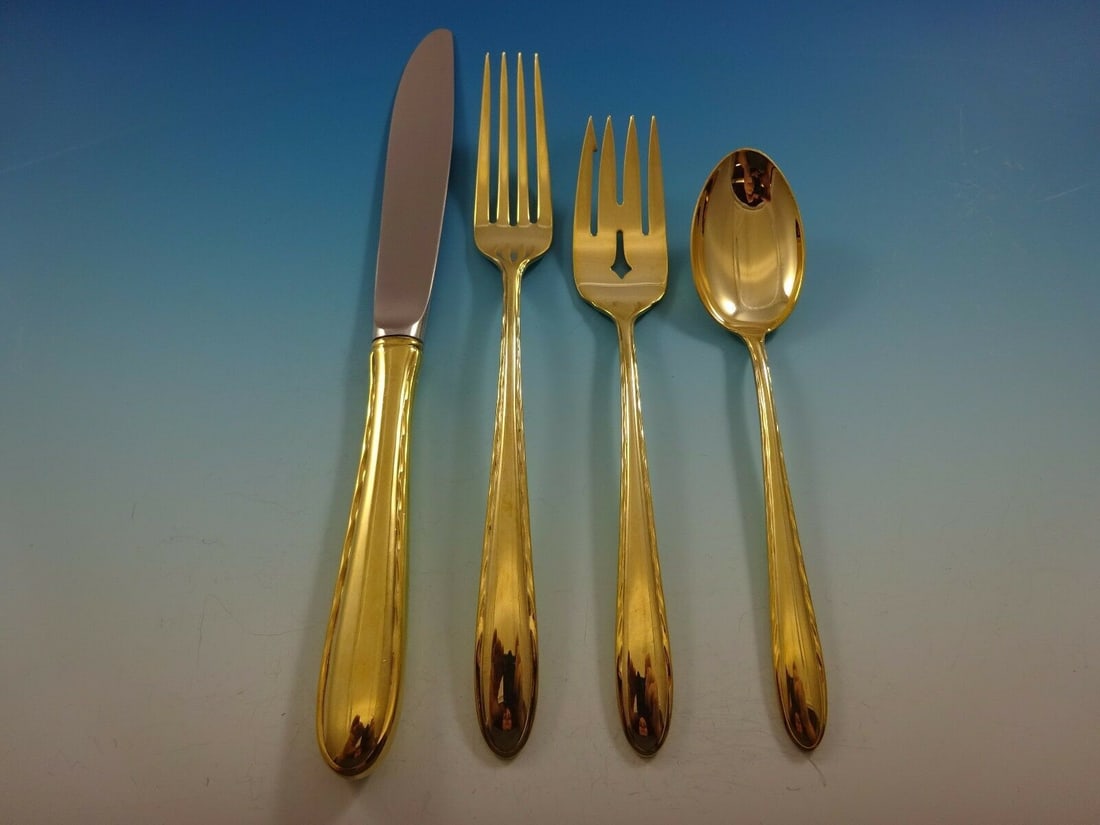 Towle Silver Flutes Vermeil 4-Piece Sterling Silver Place Setting: Towle Silver Flutes Vermeil 4-Piece Sterling Silver Place Setting Elevate your dining experience with this exquisite 4-piece place setting from the Silver Flutes Vermeil collection by Towle. Crafted f