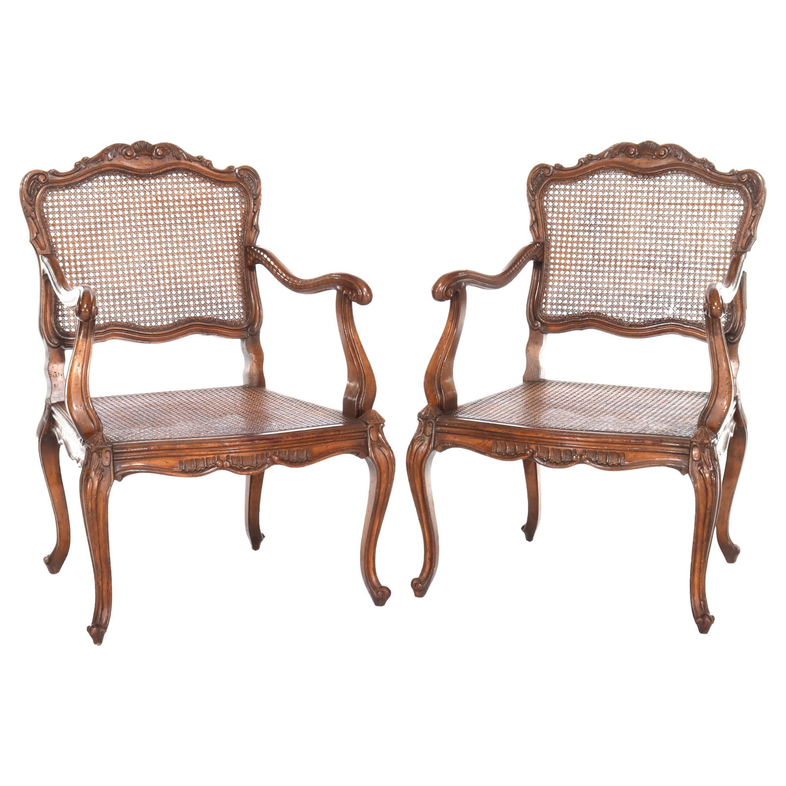 Set of 2 Antique French Louis XIV Walnut Cane Armchairs: Set of 2 Antique French Louis XIV Walnut Cane Armchairs This exquisite pair of antique French armchairs showcases the elegance of the Louis XIV style, crafted in the 20th century. Each chair features 