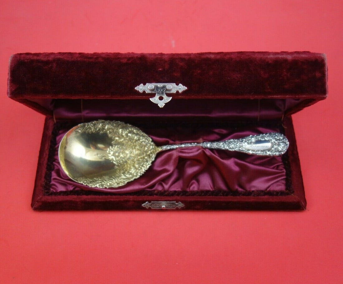 Durgin Chrysanthemum Sterling Silver Berry Spoon 9 3/8" in Fitted Box: Durgin Chrysanthemum Sterling Silver Berry Spoon 9 3/8" in Fitted Box This exquisite serving spoon, crafted by Durgin, features the elegant Chrysanthemum pattern and is made of sterling silver. Measur