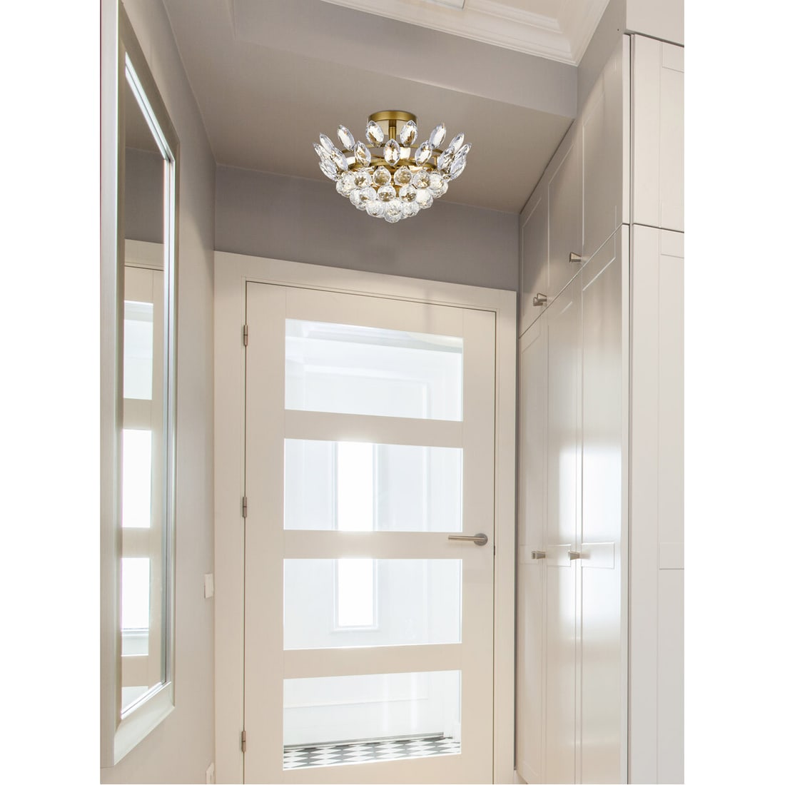 Emilia Brass Crystal Flush Mount 3 Light Ceiling Fixture 14 inch: Emilia Brass Crystal Flush Mount 3 Light Ceiling Fixture 14 inch This modern flush mount chandelier features a brass and clear finish with royal cut crystals, offering a sophisticated touch to any ind