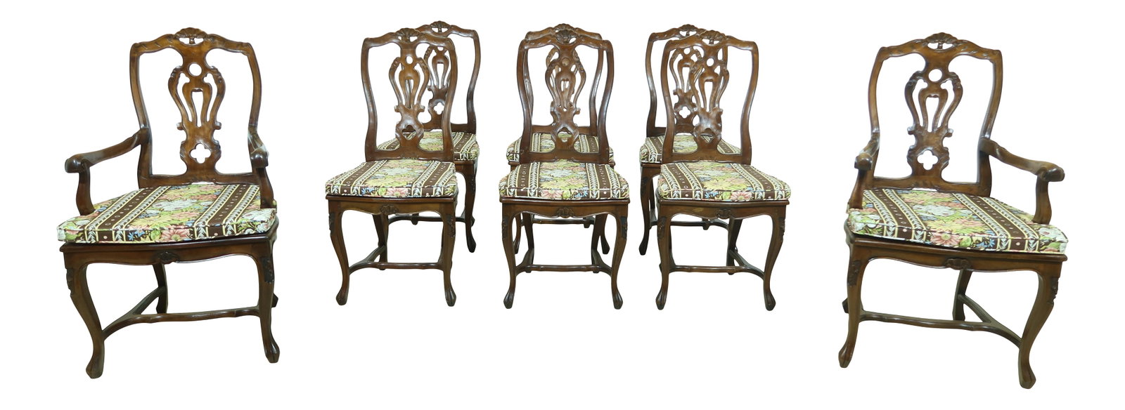 Set of 8 Vintage Italian Walnut Dining Chairs with Cane Seats: Set of 8 Vintage Italian Walnut Dining Chairs with Cane Seats This exquisite set of 8 Italian walnut dining room chairs features beautifully hand-crafted cane seats and showcases elegant carved detail