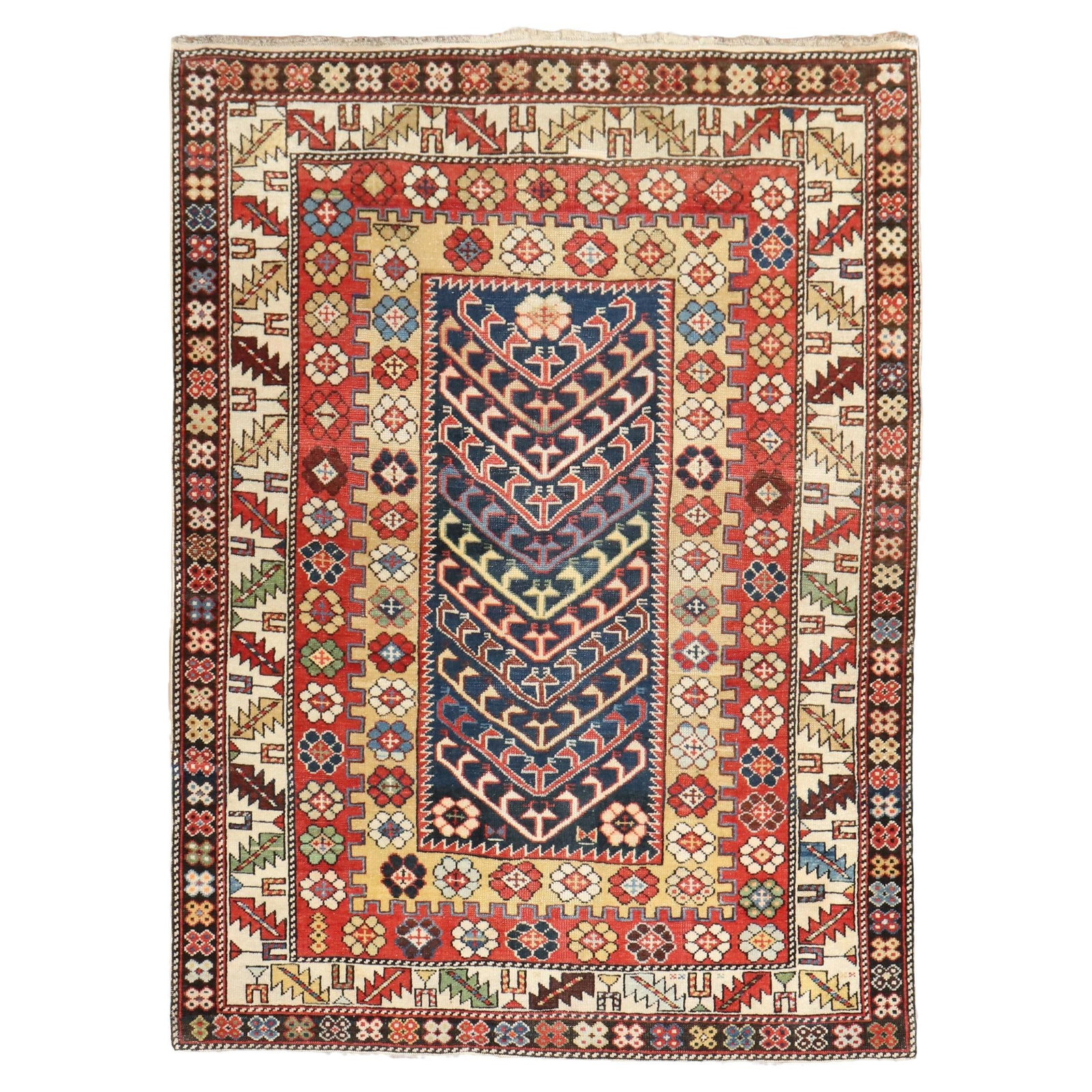 Colorful Early 20th Century Caucasian Shirvan Kazak Rug 45 x 58: Colorful Early 20th Century Caucasian Shirvan Kazak Rug 45 x 58 This early 20th-century Caucasian decorative rug features a whimsical directional motif complemented by a vibrant multi-band border. Han