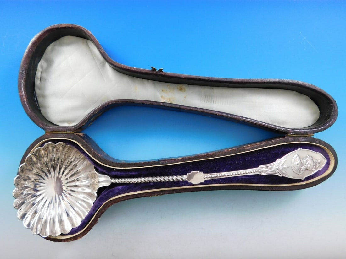 19th Century Sterling Silver Medallion Soup Ladle with Box 11.75": 19th Century Sterling Silver Medallion Soup Ladle with Box 11.75" This exquisite sterling silver soup ladle, crafted in the 19th century (1850-1899), features a stunning Medallion pattern attributed t