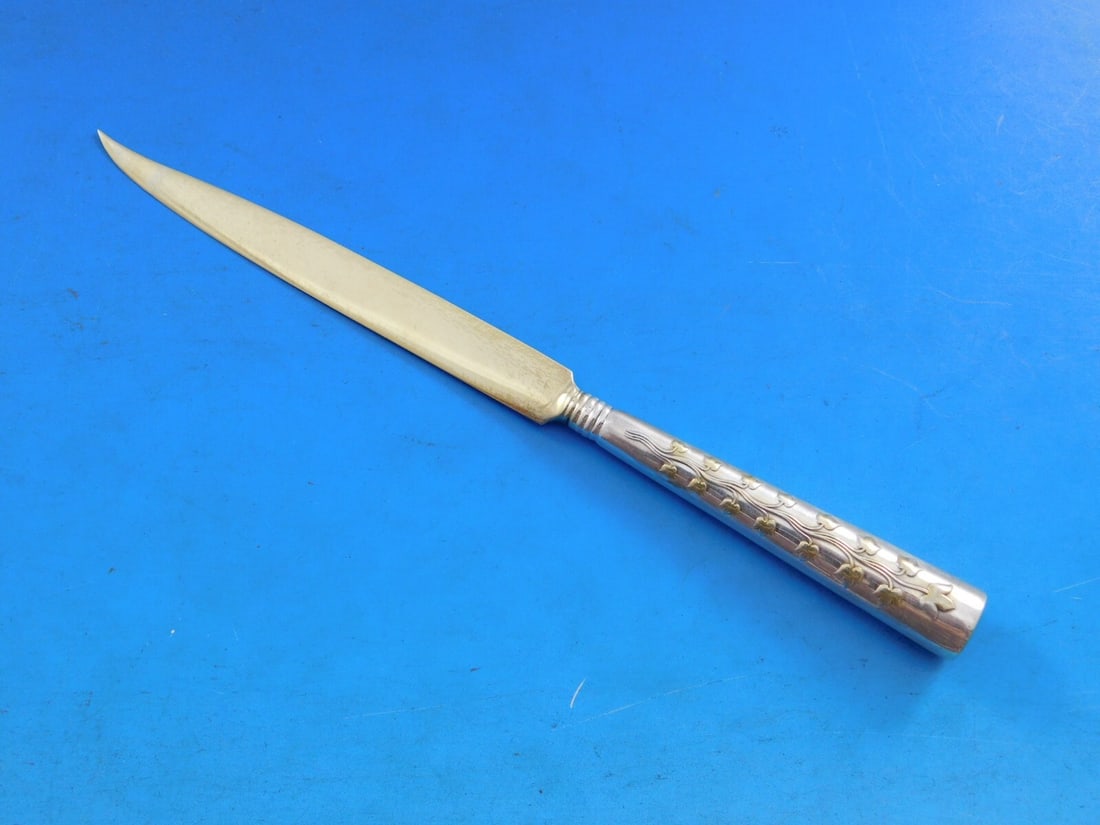 Tiffany & Co. Greek Handle Sterling Silver Fruit Knife with Gold Leaves: Tiffany & Co. Greek Handle Sterling Silver Fruit Knife with Gold Leaves This exquisite Greek Handle fruit knife by Tiffany & Co. showcases a stunning design with raised gold leaves on both sides. Craf