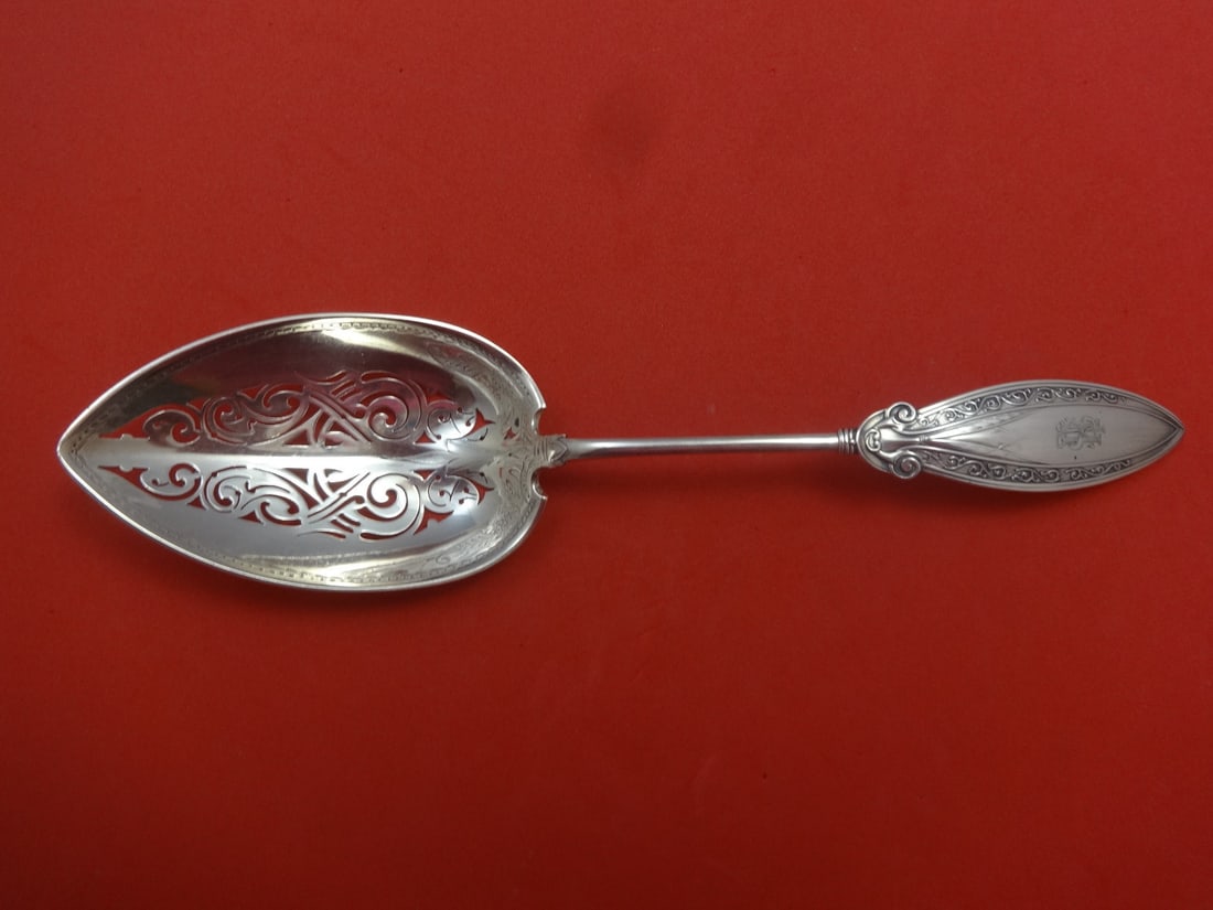 Gorham Persian Sterling Silver Ice Spoon 9.5 Dated 1874 Monogrammed: Gorham Persian Sterling Silver Ice Spoon 9.5 Dated 1874 Monogrammed This exquisite serving spoon is a stunning piece from the Persian pattern by Gorham, crafted in sterling silver. Measuring 9 1/2" in