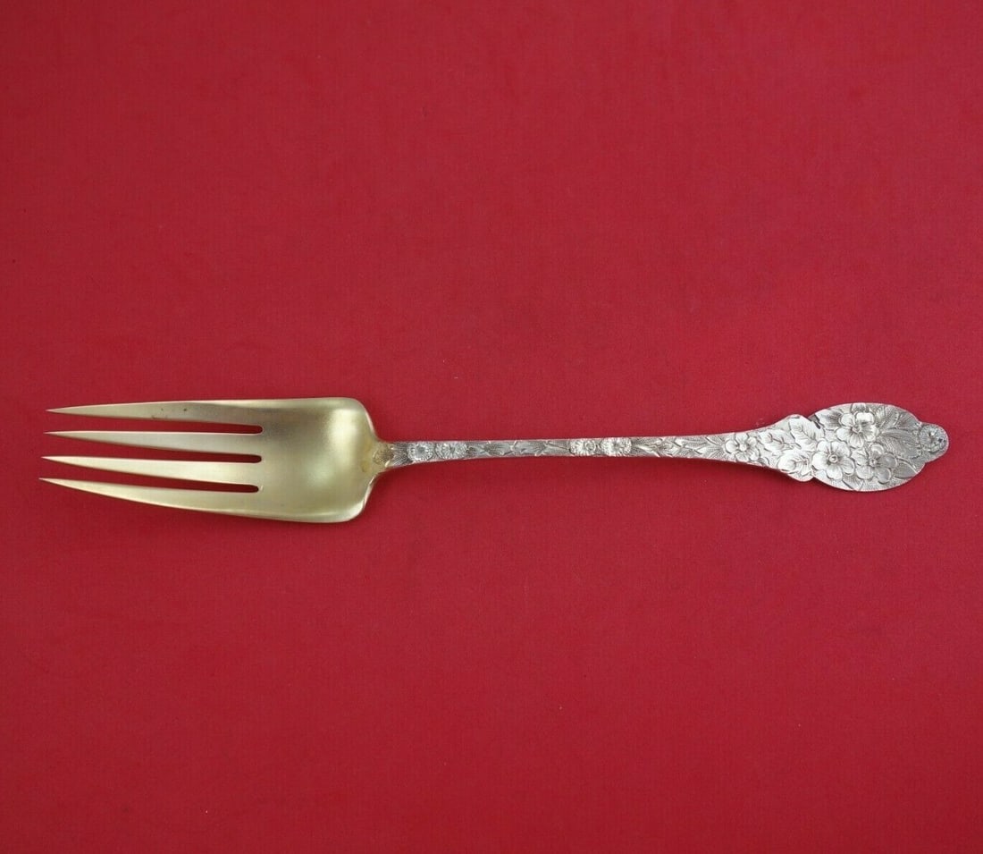 Repousse Sterling Silver Buffet Fork Gold Washed 10 Inch Serving: Repousse Sterling Silver Buffet Fork Gold Washed 10 Inch Serving This exquisite serving fork features a beautiful Repousse pattern, crafted from sterling silver and enhanced with a gold wash. Measurin