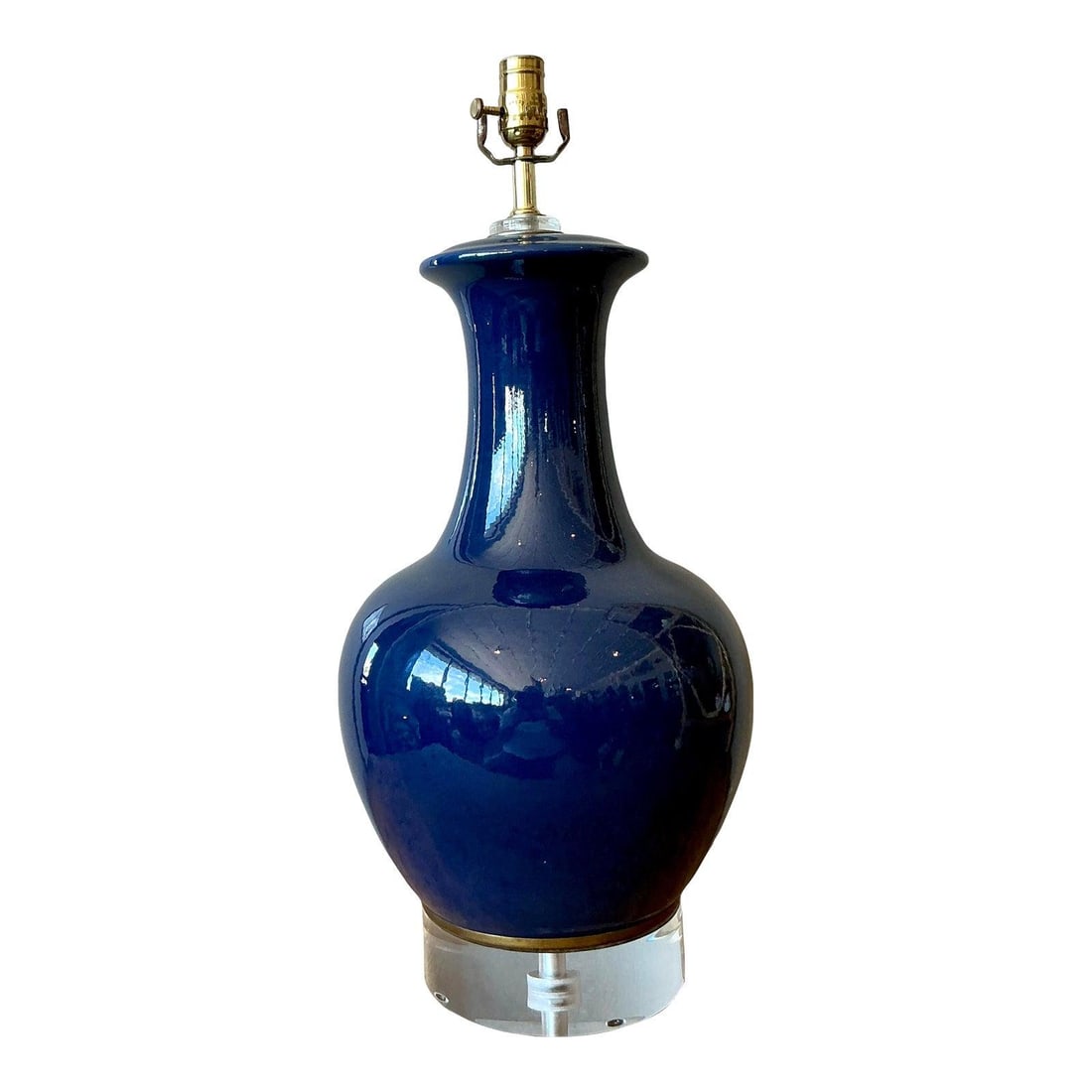 Navy Blue Ceramic Table Lamp with Lucite Base Hollywood Regency Style: Navy Blue Ceramic Table Lamp with Lucite Base Hollywood Regency Style This vintage Regency table lamp features a classic bottle vase silhouette crafted from high-gloss ceramic in a deep navy blue, nea